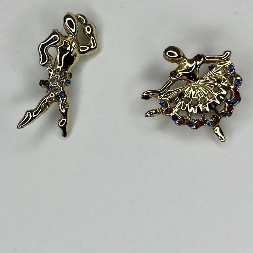 GOLD TONE AND RHINESTONE DANCING BROOCHES - MULTICOLOR DANCERS.‎
